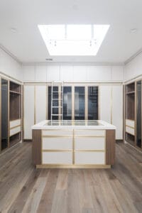 custom closet with white millwork